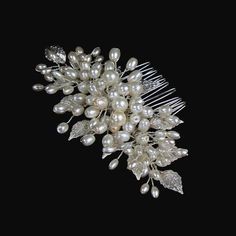 imple pearl wedding hair comb with silver tone leaves. 

#weddinghaircombs