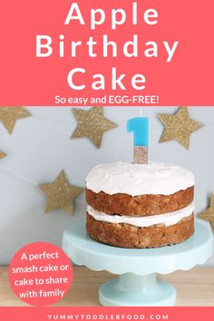 an advertisement for a birthday cake with the number one candle on it and stars in the background