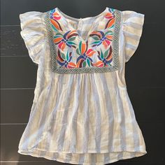 L Love Short Sleeved Embroidered Peasant Top. Size Small. New Without Tags. Casual Multicolor Embroidered Top, Casual Blue Embroidered Short Sleeve Top, Spring Beach Embroidered Blue Top, Casual Multicolor Embroidered Beach Top, Blue Floral Embroidery Top For Vacation, Spring Blue Embroidered Top For Beach, Blue Embroidered Cotton Top For Beach, Blue Floral Embroidery Beach Tops, Blue Embroidered Top For Spring Beach Occasion