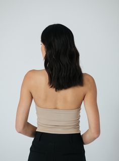 Details Crystal is the tube top your closet has been missing. Double lined on the front and she does not slip. Featuring a hold-you-in fabric and sits at the natural waistline. Made in LA Pre-washed Stretch Bandeau Camisole With Built-in Bra, Fitted Sleeveless Tube Top With Built-in Bra, Seamless Stretch Bandeau Camisole, Stretch Seamless Bandeau Camisole, Fitted Tube Top With Built-in Bra For Night Out, Stretch Tube Top With Built-in Bra, Strapless Stretch Seamless Camisole, Chic Strapless Stretch Camisole, Seamless Stretch Strapless Camisole