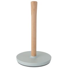 a wooden stick on top of a white base with a gray base and wood handle