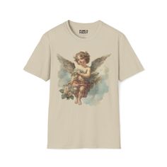 Trending Cherub Angel vintage Victorian style graphic Unisex Softstyle T-Shirt, Angel gifts, jmj 23, angel tee, boho chique, cottagecore,  The unisex soft-style t-shirt puts a new spin on casual comfort. Made from very soft materials, this tee is 100% cotton for solid colors. Heather colors and sports grey include polyester. The shoulders have twill tape for improved durability. There are no side seams. The collar is made with ribbed knitting to prevent curling damage.  .: Made with 100% ring-spun cotton, a lightweight fabric (4.5 oz/yd² (153 g/m this unisex t-shirt feels like a bliss to wear all year round.  .: The classic fit with the crew neckline deliver a clean, versatile style that can match any occasion, whether it's formal or semi-formal.  .: All shirts feature a pearlized, tear-aw Cottagecore Printed Crew Neck T-shirt, Fairy Grunge Cotton T-shirt With Graphic Print, Fairy Grunge Graphic T-shirt For Summer, Summer Fairy Grunge T-shirt With Crew Neck, Cottagecore Graphic Print T-shirt, Cottagecore Graphic Print Short Sleeve T-shirt, Fairy Grunge Graphic Print Crew Neck T-shirt, Chic Cottagecore, Angel Shirt