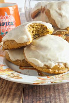 some frosted cookies are on a plate