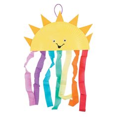 a paper plate shaped like a jellyfish with sun on it's head and rainbow streamers