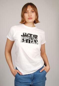 "* Size: Medium * Vintage unisex 70s Jack And The Rippers t-shirt by Fruit of the Loom. * Suuuuper rare original tee from an incredibly obscure Swedish garage punk band! White single stitch t-shirt with Jack And The Rippers design printed on front. Made in USA. * Excellent vintage condition. Some faint collar discoloration. No other stains or holes. * Material: Cotton or blend - MEASUREMENTS - CHEST (doubled) 34\" LENGTH (top of shoulder to bottom of garment) 25.5\" SHOULDER WIDTH (seam to seam) 15\" ---- FEEL FREE TO MAKE A REASONABLE OFFER ON ANY ITEM ~ Returns accepted on all items ~ ~ Ask about discounts on multiple item orders ~" White Band Logo T-shirt Relaxed Fit, White Punk Top With Band Logo, White Unisex Tops With Band Logo, White Unisex Top With Band Logo, White Punk Band Logo T-shirt, Retro White Tops With Band Logo, Retro White Top With Band Logo, Unisex Retro Band Logo T-shirt, Unisex Retro Top With Band Logo