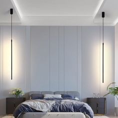 a bed sitting in the middle of a bedroom next to two lamps on either side of it