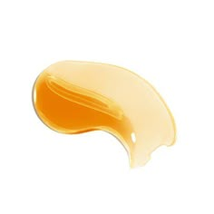 an orange liquid flowing down the side of a white surface on top of a white background