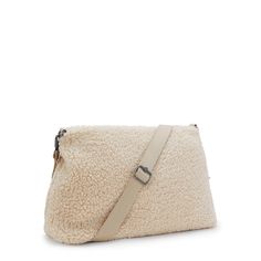 The fuzzy shoulder bag with two strap options! Wear Pollie as a crossbody or shoulder bag depending on how you're feeling for the day. Pollie Medium is the fall staple handbag that'll make any outfit. Cream Shoulder Bag For Winter Travel, Winter Travel Cream Shoulder Bag, Winter Crossbody Shoulder Bag For Daily Use, Cream Shoulder Bag For Fall, Cream Shoulder Bag For Everyday Fall Use, Winter Rectangular Shoulder Bag With Detachable Strap, Winter Beige Crossbody Shoulder Bag, Winter Satchel With Adjustable Strap For Everyday Use, Winter Satchel With Adjustable Strap