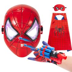 a spider - man mask and glove with light up eyes are shown in front of a white background