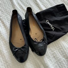 -Classic Ballerina Flats -Black Leather -Black Leather Bow -Classic Black Patent Toe -Cc Symbol On Toe -Mini Heel -Size: 38 / Us: 7 Condition: Well Loved, Lots Of Life Left. Leather Is In Great Condition, Patent Toes Have Little Scuffing, Interior Lining Is Dingy, Bottom Exterior Soles Have Heel Replacement. Black Chanel Ballet Flats, Shoes Chanel, Leather Bow, Leather Bows, Leather Ballet Flats, Ballerina Flats, Chanel Black, Chanel Shoes, Ballet Flat