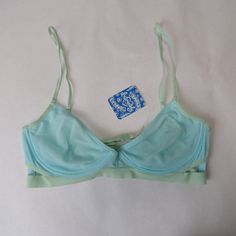 Please Make Sure You Choose The Correct Size! New With Tags Cup Is Not Shaped But Does Have Underwire. Fabric Is See Thru Color Is Blue And Band Is A Blue/Green Color Intimately Free People Green Underwire Bra For Summer, Blue Summer Bra With Built-in Support, Stretch Underwire Bra In Light Blue, Light Blue Stretch Underwire Bra, Summer Light Blue Bra With Built-in Support, Summer Light Blue Bra With Built-in Bra, Light Blue Summer Bra, Blue Partially Lined Underwire Bra, Blue Summer Bra With Removable Pads