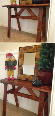 a wooden table with a mirror on it and a stuffed animal at the top in front