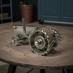 an old table with some metal parts on it