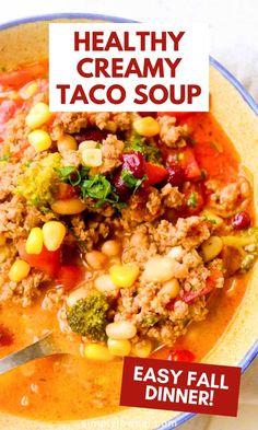 a bowl filled with taco soup next to a sign that says healthy creamy taco soup