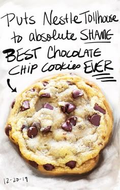 a chocolate chip cookie sitting on top of a piece of paper with the words, put's nestle tollhouse to absolute shame best chocolate chip cookie ever