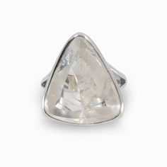 Manifestation Clear Quartz Triangle Ring Made in Earth Ethereal Silver Crystal Ring With Gemstone, Clear Gemstone Crystal Ring For Wedding, Clear Crystal Ring With Vs Clarity For Anniversary, Mystical Crystal Gemstone Ring For Anniversary, Mystical White Gemstone Crystal Ring, White Gold Crystal Ring With White Topaz Gemstone, Elegant Silver Crystal Ring With Natural Inclusions, Unique Crystal Ring With Si Clarity For Anniversary, Mystical Silver Gemstone Crystals