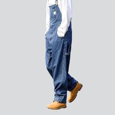 Introducing the 2023 Spring-Summer Collection of our new men's striped free denim dungarees ââ‚?the perfect way to show off your street style!Why You'll Love ThemFashionably rebellious. these dungarees feature vertical stripes and a loose fit for an effortless. laid-back look. With suspenders and a buttons closure. you'll be sure to stand out from the crowd in a stylish and comfortable way. Crafted from high-quality denim. these dungarees promise to be as durable as they are fashionable.Key High Casual Striped Denim Jeans, Casual Striped Cotton Jeans, Casual Striped Denim Pants, Trendy Striped Pants For Streetwear, Striped Cotton Pants For Streetwear, Striped Denim Jeans With Pockets, Casual Vertical Striped Jeans For Summer, Casual Summer Jeans With Vertical Stripes, Striped Bottoms For Spring Streetwear