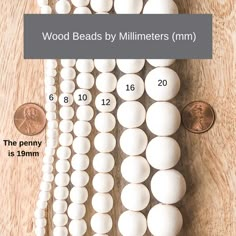 the measurements for wood beads by millmeters mm and 1 / 2 penny are shown