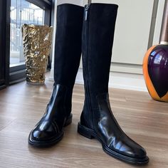 - Designer = Jill Sander - Size = 8m(38). Trunk 10 - Color Black - Jill Sander Made In Italy 1leather & Suede Trim 8m(38) Black Riding Boots - Heel Height = 1” Inch - Leather Interior Lining And Leather Outsole - Measured Underneath Outsole From Tip Of Front Of Shoes To Back Tip Of Heel To Give An Estimate Of Size 1length =Approximately 28cm - Circumference Measured At Top Tip Of Boots All Around At One Point And Back = Approximately 34cm - Side Functional Zip - Circumference Measured Around Shi Classic Black Boots With Suede Lining, Black Knee-high Moto Boots For Riding, Black Knee-high Moto Riding Boots, Classic Black Calf Leather Knee-high Boots, Classic Black Knee-high Riding Boots, Black Knee-high Riding Boots For Fall, Formal Knee-high Calf Leather Moto Boots, Black Low Heel Knee-high Boots For Winter, Black Knee-high Boots With Round Toe For Riding