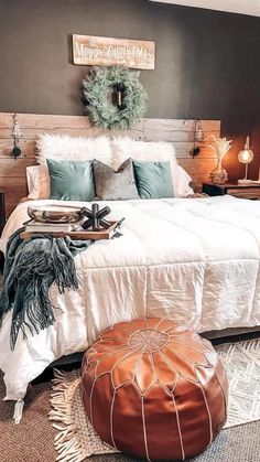 a large bed sitting in a bedroom on top of a carpeted floor next to a wooden dresser