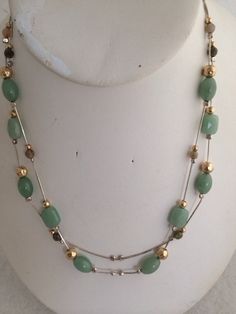 "Genuine Aventurine Sectional Beaded Double Snake Chain Sterling Silver 925 Hammered Accent Gold & Silver Beads stunning Necklace Smokey glass and gold bead accents Marked 925 = Sterling Silver Measures length - each chain measures approx 16\"Free Shipping on orders over $35.00 however if there is a return buyer to refund seller for the free shipping cost to seller." Gold Aventurine Beaded Jewelry, Silver Aventurine Round Beads Jewelry, Elegant Aventurine Beaded Necklaces With Polished Beads, Aventurine Beaded Necklace With Faceted Beads, Elegant Aventurine Beaded Necklace With Polished Beads, Silver Jade Jewelry With Faceted Beads, Stunning Necklace, Snake Chain, Gold Beads