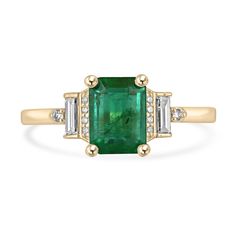 Experience sheer luxury with our Emerald and Diamond Ring, where a captivating emerald cut Zambian emerald takes center stage, exuding a lush rich green hue and transparent clarity. Expertly set in a vertical four-prong arrangement, this emerald is elegantly complemented by four petite round cut diamonds along its sides, a bezel-set baguette cut diamond next to it, and a delicate round cut diamond at the end. Crafted in 14k yellow gold, this masterpiece seamlessly merges classic design with modern elegance, offering a truly enchanting addition to your jewelry collection. Setting Style: Prong/Pave/Bezel  Setting Material: 14K Yellow Gold Setting Weight: 2.5 Grams Main Stone: Emerald Shape: Emerald Cut  Weight: 1.55-Carats Dimensions: 7.85mm x 5.8mm x 4.05mm  Clarity: Transparent  Color: Lus Emerald And Diamond Ring, Emerald Gem, Diamond Accent Ring, Tiny Bow, Zambian Emerald, Minimalist Gifts, Yellow Gold Setting, Baguette Cut Diamond, Rich Green