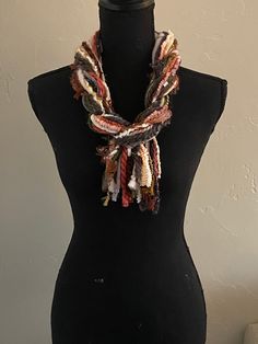 "This handmade scarf consists of a variety of yarn strands in rust browns and grays.  I utilize a variety of yarns in each of my scarves and no two are ever the same.   Each scarf is made up of a selection of Sari Silk, Eyelash, Ribbon, Ladder, Fuzzy, Sparkly, Pouf Pom Pom, Boucle, Flag Ribbon, Nub, Pluscious, Hand Spun, and Brushbound. It is approximately 70\" long. This is an open fringe style, tied at center allowing for styling flexibility.  It is a medium weight scarf. Check out this YouTube link for a demonstration of the many ways that you can style this scarf: https://www.youtube.com/watch?v=5LYAEz777AU" Brown Yarn Scarf For Fall, Bohemian Knit Scarves For Fall, Teal Scarf, Large Turquoise Ring, Fringe Fashion, Eyelash Yarn, Handmade Scarf, Boucle Yarn, Boho Scarfs