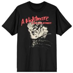 Scare up some style with this Nightmare on Elm Street tee. The shirt features a vintage image of Freddy Krueger’s face and claws under red letters that spell out the film’s title. The tee comes in a black short sleeve crew neck. Nightmare on Elm Street fans will love this comfy cotton tee. Horror Graphic Print Short Sleeve T-shirt, Vintage Halloween T-shirt With Character Print, Horror Graphic Print T-shirt For Fans, Horror Graphic Print Short Sleeve Shirt, Vintage Halloween Fan Merchandise T-shirt, Pre-shrunk Horror T-shirt For Streetwear, Street Film, Horror Movie Shirts, Red Letters