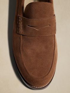 A timeless penny loafer, this sumptuously soft suede shoe preserves the traditional look with the signature penny slot across the vamp, updated here in a more modern shape.  Designed with lightweight, durable OrthoLite® performance insoles for breat Classic Suede Semi-formal Slip-ons, Business Suede Moccasins With Cushioned Footbed, Suede Loafers With Cushioned Footbed For Work, Semi-formal Fall Suede Dress Shoes, Fall Semi-formal Suede Dress Shoes, Classic Suede Loafers With Rubber Sole, Suede Loafers With Cushioned Footbed, Business Suede Moccasins With Suede Lining, Suede Moccasins For Business Casual In Fall