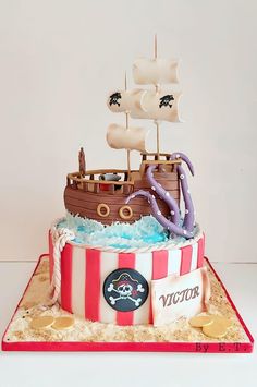 a birthday cake with a pirate ship on top