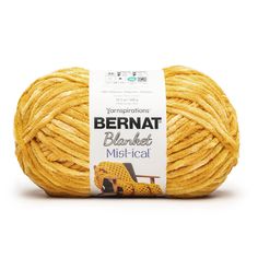 the yarn ball is yellow and has a white label on it that says bernat