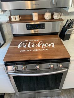 a kitchen with stainless steel appliances and wooden counter tops that says, do not enter the kitchen