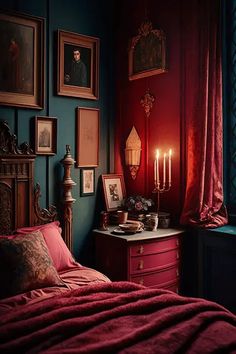 a bedroom with red walls and pictures on the wall