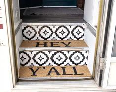 some steps with the words hey y'all painted on them in black and white