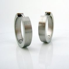 Men's extra large stainless steel hoop earrings.  These men's earrings are 19mm in diameter and 4mm wide.We have all sizes available from XS, S, M, L, and XL.Metal: stainless steelOuter Diameter: approximately 19mmWidth 4mm (Extra Large)Inner Diameter: approx 15mmShop policy http://www.etsy.com/shop_policy.php?Learn about the good quality of stainless steel jewelryhttp://360jewels.blogspot.com/2009/12/why-stainless-steel-jewelry-works.htmlThank you for your interest in our men's XL steel hoop ea Modern Stainless Steel Nickel Free Huggie Earrings, Minimalist Stainless Steel Jewelry With Brushed Finish, Modern Small Hoop Stainless Steel Huggie Earrings, Modern Stainless Steel Small Hoop Huggie Earrings, Minimalist Stainless Steel Hoop Huggie Earrings, Modern Stainless Steel Huggie Jewelry, Modern Everyday Jewelry With Brushed Finish, Modern Stainless Steel Hypoallergenic Huggie Earrings, Modern Hypoallergenic Stainless Steel Huggie Earrings