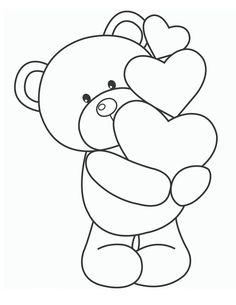 a teddy bear holding a heart shaped object