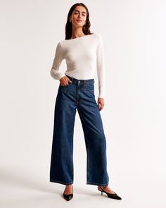 Elevate your wardrobe with the Abercrombie & Fitch Women's High Rise Cropped Wide Leg Jeans, a perfect blend of comfort and style. These jeans feature a sophisticated dark marble wash and a flattering high-rise design that accentuates your waist.

- Size: 28 LONG
- Color: Dark Marble
- Material: Cotton, TENCEL™ Lyocell
- Gender: Female
- Fit: High rise, 10.5” rise, relaxed at the waist and hips, wide and full-length leg shape with a cropped length

Crafted from a super soft, lightweight rigid de Dark Marble, Statement Outfit, Cropped Wide Leg Jeans, Denim Crafts, Elegant Blouses, Dressy Tops, Pocket Bag, Casual Tee, Polished Look