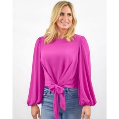 MAGENTA TIE BLOUSE $45 Relaxed Fit Round Neckline Subtle Shoulder Pleating Adjustable Front Fabric Tie Long Billowed Sleeves Elastic Sleeve Hems Lightweight Crepe Fabric Back Button Closure at Neckline with Keyhole Not Lined – Semi Sheer Care: Hand Wash Cold, Lay Flat to Dry Lay Flat, Relaxed Fit, Elastic