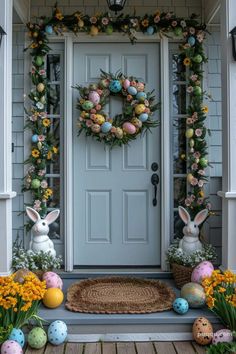 a front door decorated for easter with wreaths and bunnies