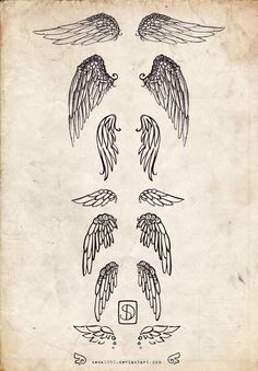 an old book with angel wings on the page and two smaller ones in the middle