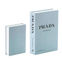 an open book with the words prada catwalk printed on it's cover