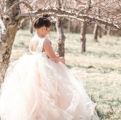 "This modern yet classic tutu dress features a lined ivory satin sleeveless bodice with a peach blush and ivory blend tulle skirt to yield this lovely blush color. The back of the dress bodice is stretchy for a custom, yet versatile, comfort fit. We can change these colors! WANT A SEWN IN SLIP TO LINE THE TUTU? https://www.etsy.com/listing/125566641/add-a-slip-to-the-tutu-dress-sewn-in?ref=shop_home_active_2 At checkout, please give us the following information: HOW TO ORDER: IMPORTANT We recomm Spring Princess Dress With Fitted Bodice For Bridesmaid, Spring Princess Dress With Fitted Bodice And Tulle, Spring Bridesmaid Ball Gown Tutu Dress, Bridesmaid Tutu Dress With Fitted Bodice And Tulle Skirt, Sleeveless Tulle Tutu Dress For First Communion, Spring Wedding Tutu Ball Gown, Tulle Tutu Dress With Fitted Bodice, Bridesmaid Ball Gown Tutu Dress With Tulle Skirt, Organza Tutu Dress With Tulle Skirt For First Communion