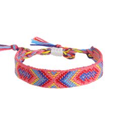 two colorful bracelets with tassels on each side and one has a white bead