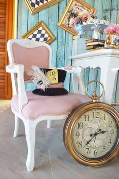 an antique clock sitting in front of a chair