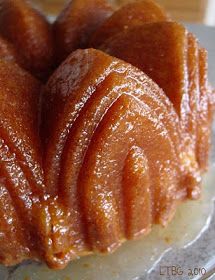 a bundt cake sitting on top of a glass plate