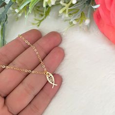 This delicate gold-plated Christian fish necklace is a mindfulness gift, it's perfect as a Baptism gift or as a girlfriend gift as well.  You will look adorable wearing this dainty necklace. The cute necklace you'll never want to take off. Perfect as a layering necklace. 💗 ITEM DETAILS: Total Length: 14 - 16 - 18 - 20 inches. The length of the necklace refers to the total length from end to end. Pendant size: Width 0.6mm -  Height 1.5mm Materials: 18K Gold plated chain - 18K Gold plated charm. Color necklace available: Gold. 💗 IF YOU WANT TO MAKE A SET, visit the following link for the earrings👇🏻 https://www.etsy.com/listing/1396625592/tiny-gold-hoop-earrings-fish-earrings?click_key=d711db464cd3938d9e46890fa316622f54bd7998%3A1396625592&click_sum=0b762eeb&ref=shop_home_active_1 💗 GIFT Gold Fish-shaped Necklace For Gift, Christian Friendship, Jesus Necklace, Christian Signs, Tiny Fish, Fish Earrings, Christian Necklace, Fish Necklace, Color Necklace