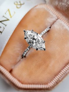 an engagement ring with a diamond in it