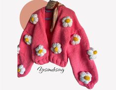 Our floral chunky cardigan is completely handmade. Knitted from soft yarn. Our wool does not contain allergens. Fits s m sizes. Its color is pink and its flowers are white. Please contact for special sizes.  - PACKAGING - Hand-made accessories suitable for the model are sent free of charge to our valued customers. The products are packaged and sent to you without any damage. I make gift packages upon your request. If you want a private note, I write. - WASHING AND STORAGE - Wash at a maximum of Handmade Acrylic Cardigan For Spring, Spring Hand Knitted Acrylic Cardigan, Spring Chunky Knit Acrylic Sweater Coat, Cozy Hand Knitted Sweater Coat For Spring, Cherry Sweater, Thick Knit Cardigan, Knit Clothing, Thick Cardigan, Gift Packages