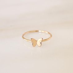 Shimmering wings, delicately perched on your finger 🦋 our graceful Butterfly Ring is sustainably handcrafted to order order, right here in our little studio! Check out the entire Butterfly Collection here: https://www.etsy.com/shop/NOLIAjewelry?ref=mini_mfts_name&listing_id=740161864&search_query=butterfly And our even daintier version of this ring here: https://www.etsy.com/listing/1509711976/tiny-butterfly-ring-gold-silver-or-rose DETAILS  * Available in 14k Gold Filled, 14k Rose Gold Filled, Minimalist Butterfly Ring As A Gift, Minimalist Butterfly Ring As Gift, Minimalist Butterfly Ring For Gift, Dainty Rose Gold Butterfly Ring For Wedding, Delicate Rose Gold Butterfly Ring For Anniversary, Delicate Adjustable Butterfly Promise Ring, Dainty Butterfly Ring For Wedding, Adjustable Minimalist Butterfly Ring As Gift, Minimalist Adjustable Butterfly Ring As Gift