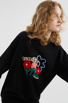 Black crewneck sweatshirt with a floral graphic. This adds a hint of spring time whimsy to the always stylish black sweatshirt. Style #: WKSH901 Black Crewneck Sweatshirt, Black Crewneck, Graphic Crewneck Sweatshirt, Crew Neck Sweatshirt, Floral Prints, Crew Neck, Sweatshirts, Floral, Black